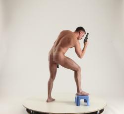 MICHAEL NAKED MAN DIFFERENT POSES WITH GUNS 3